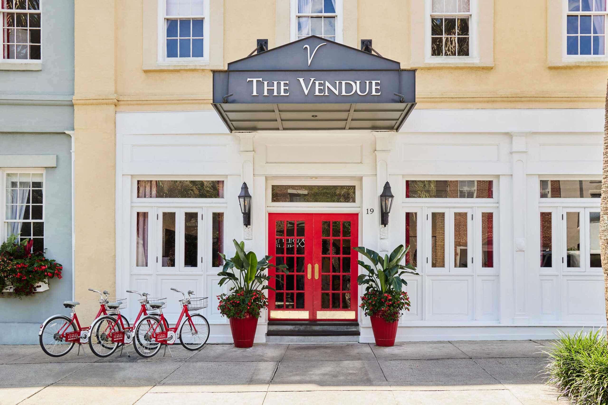 photo of the front of the hotel showing its fun colors
